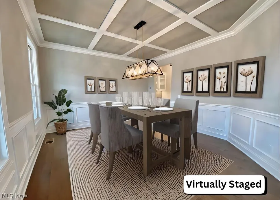 Dining Room with hardwood flooring, wainscotting and coffered ceiling