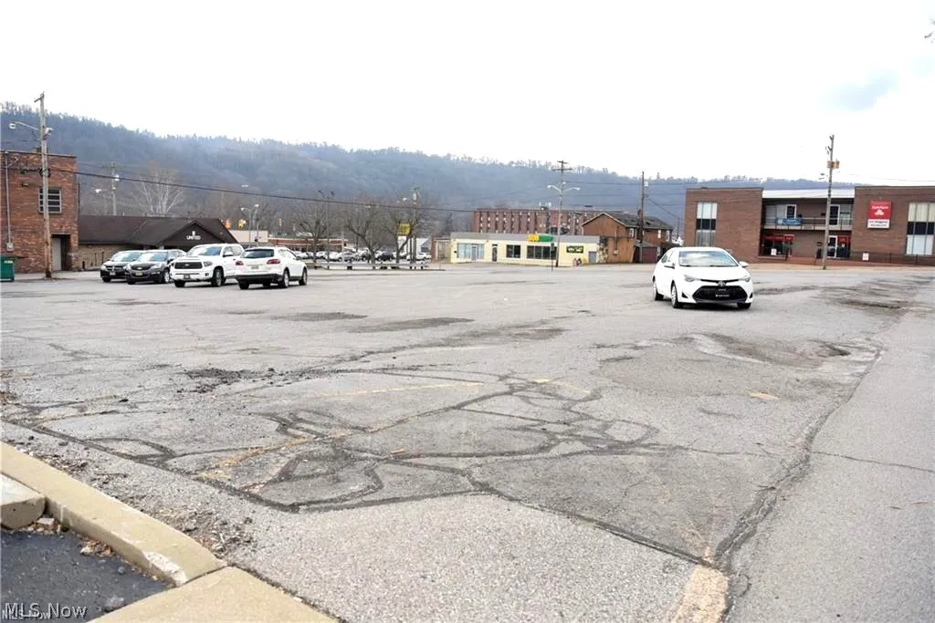View of vehicle parking with a mountain view