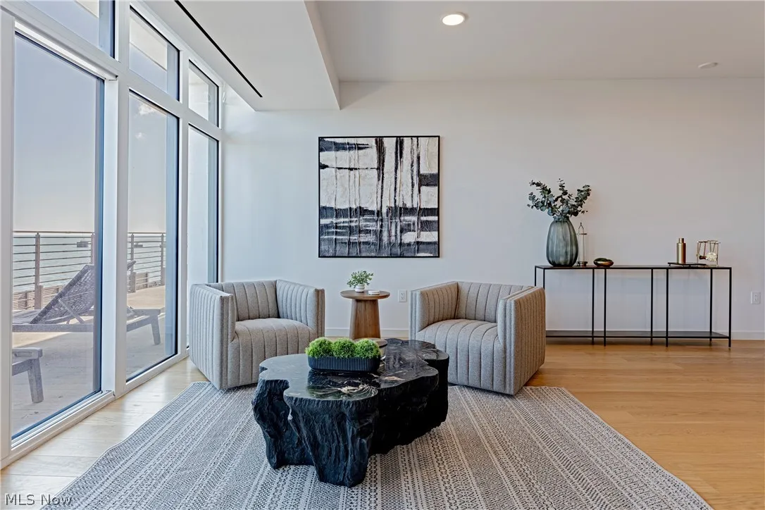 Sitting room featuring light wood-type flooring
