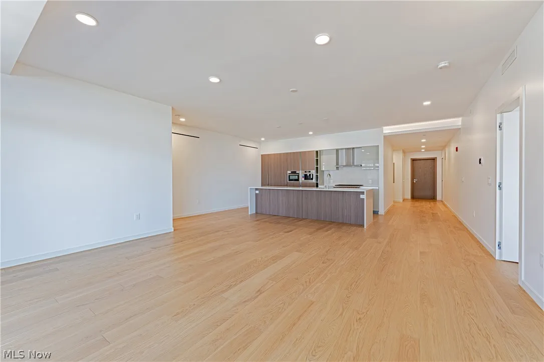 Unfurnished living room featuring light hardwood / wood-style flooring