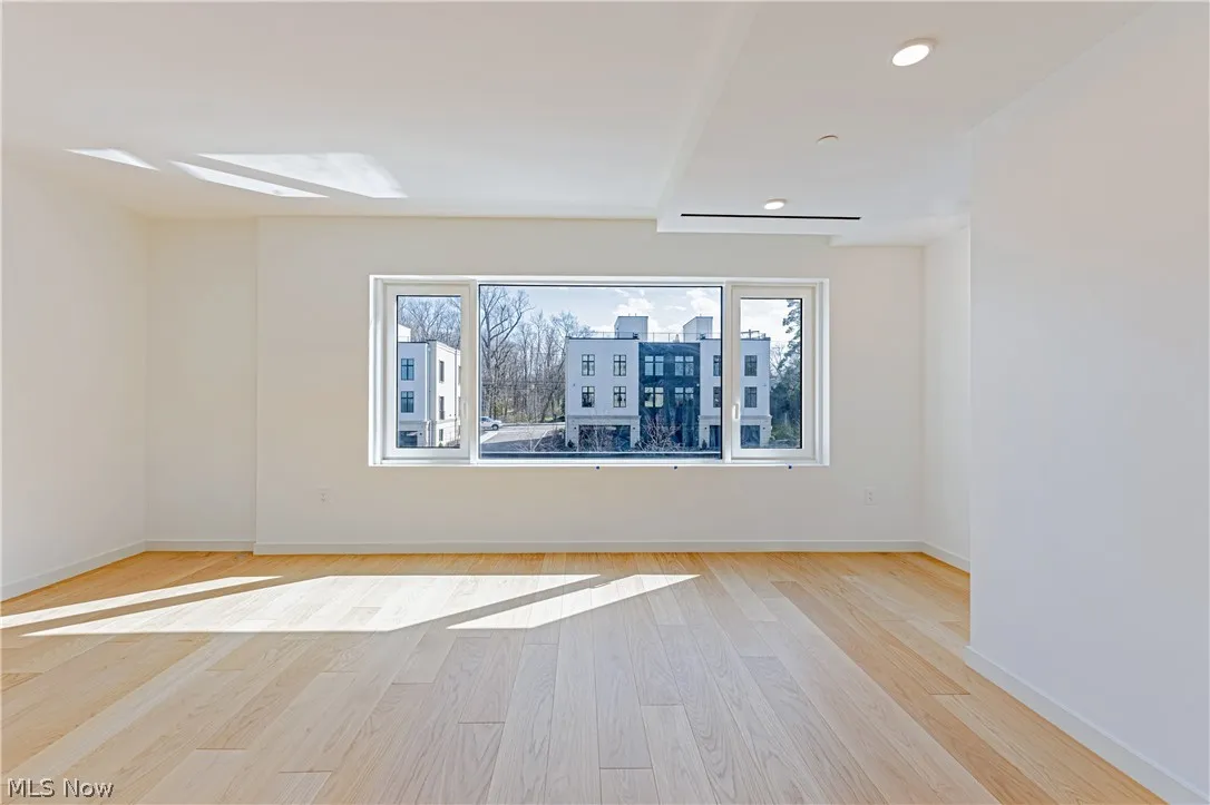 Spare room featuring light hardwood / wood-style floors