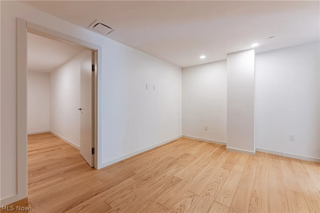 Spare room featuring light hardwood / wood-style floors