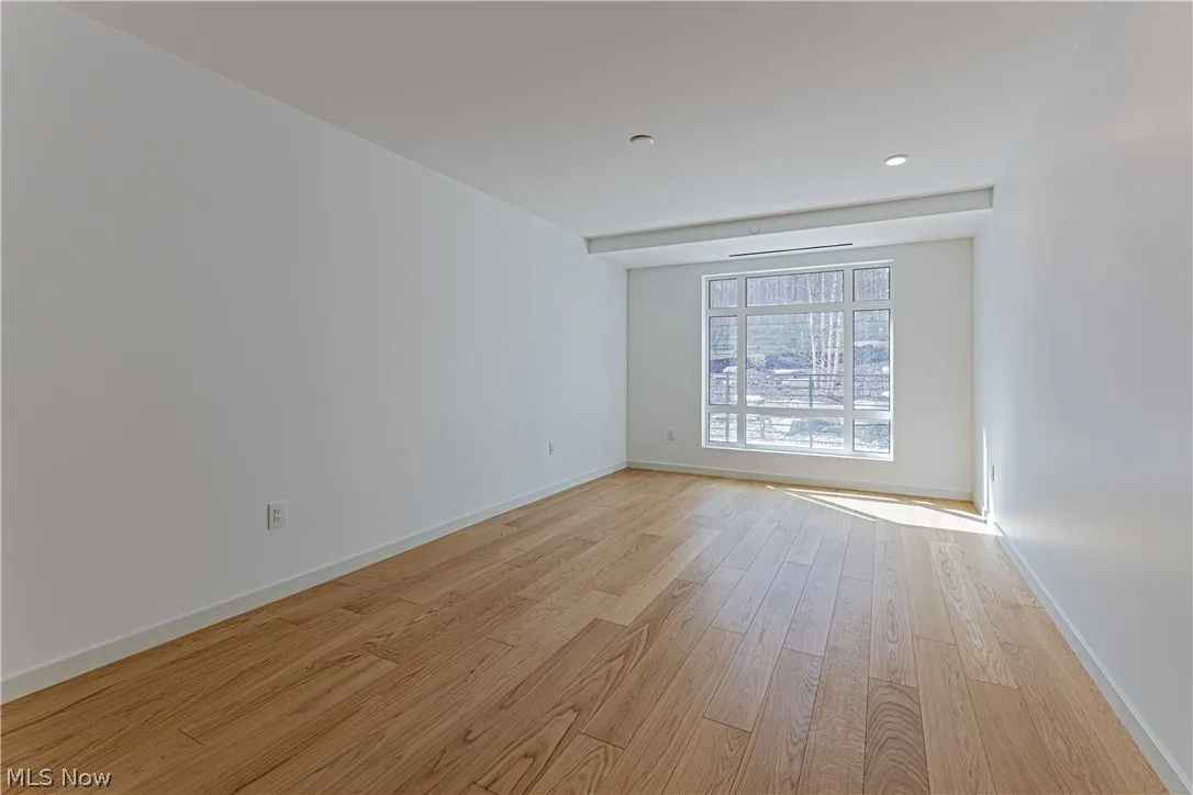 Unfurnished room featuring light hardwood / wood-style floors