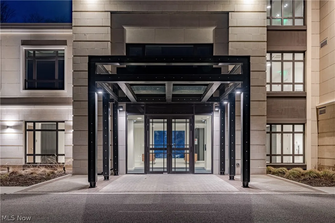 View of exterior entry at night