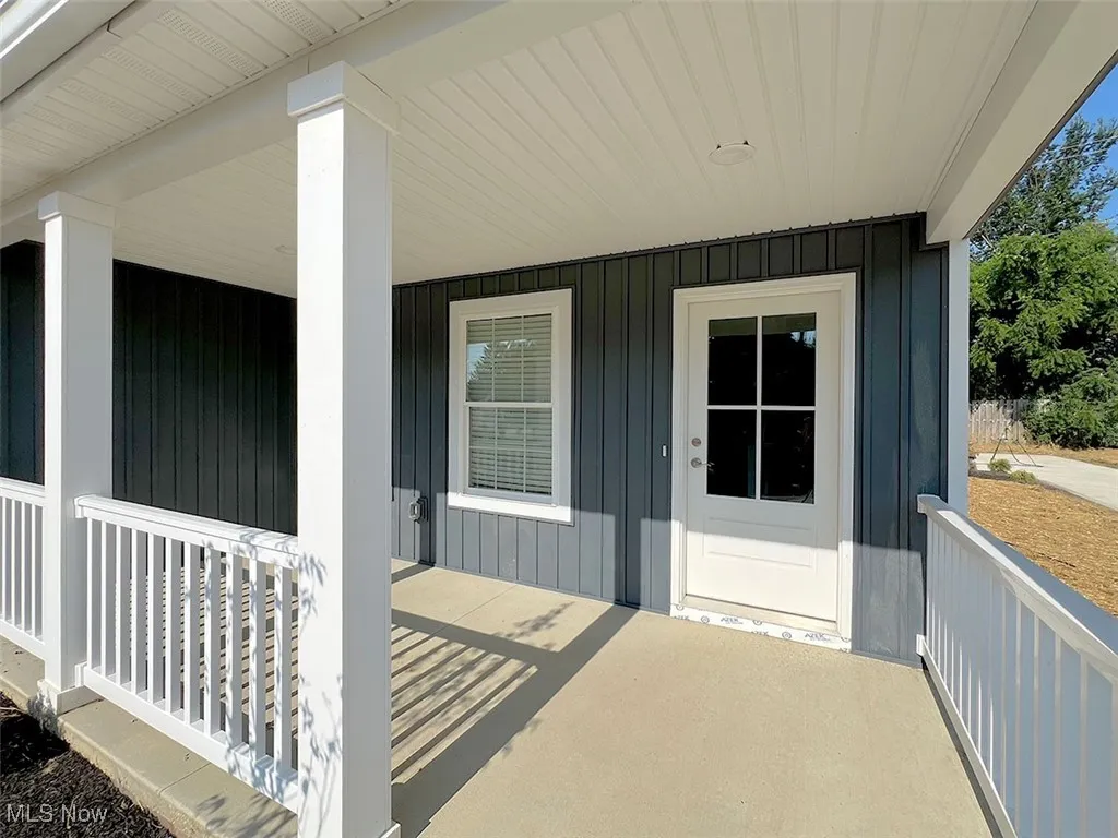 Property entrance featuring a porch