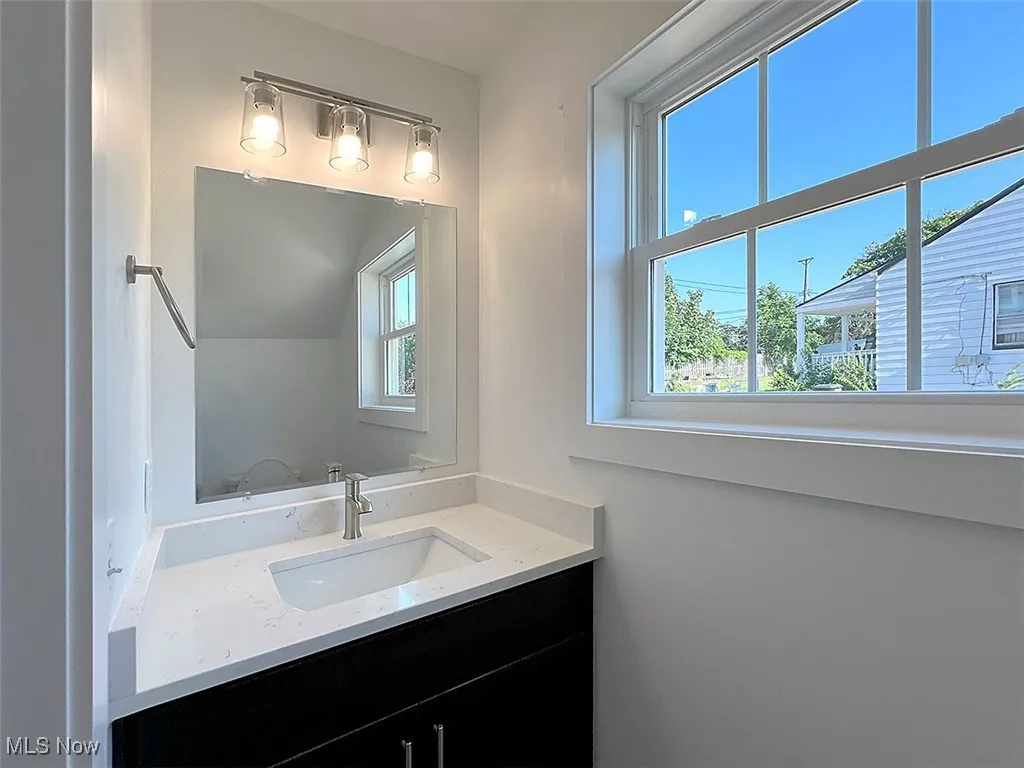Half bath with vanity level 1