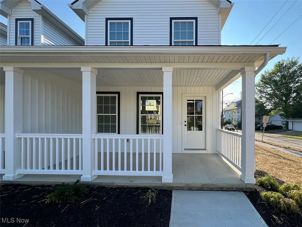 Entrance to property with covered porch