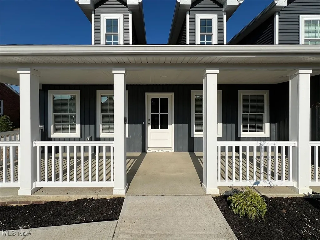 Property entrance with a porch