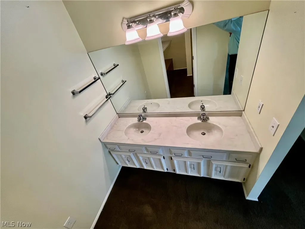 Two of the three vanities in the master bedroom