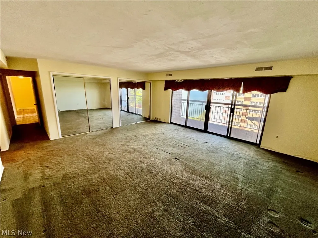 Master bedroom with three closets and the second balcony