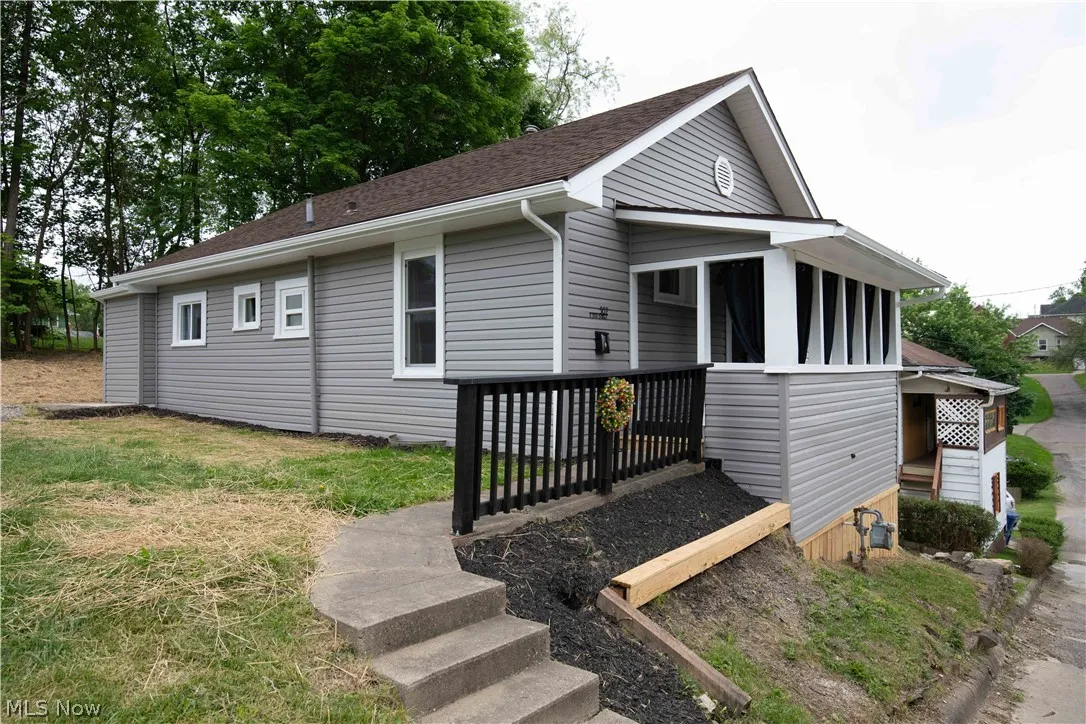 View of front of property featuring a deck