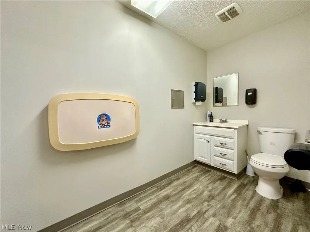 Womens Restroom with changing station