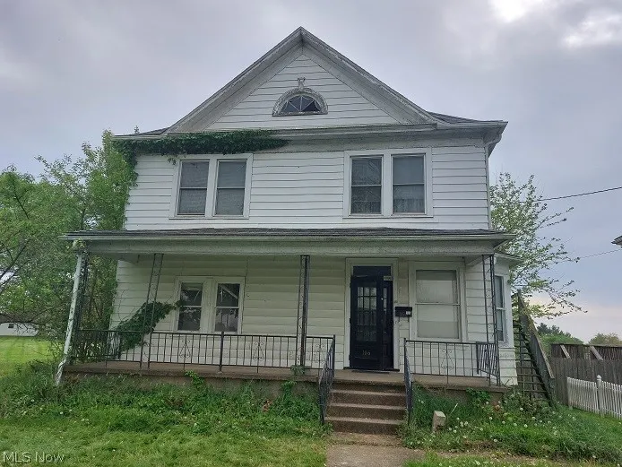 View of front of property featuring a porch