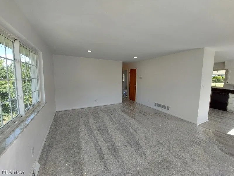 View of carpeted spare room