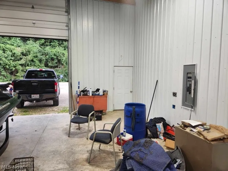 Garage featuring electric panel