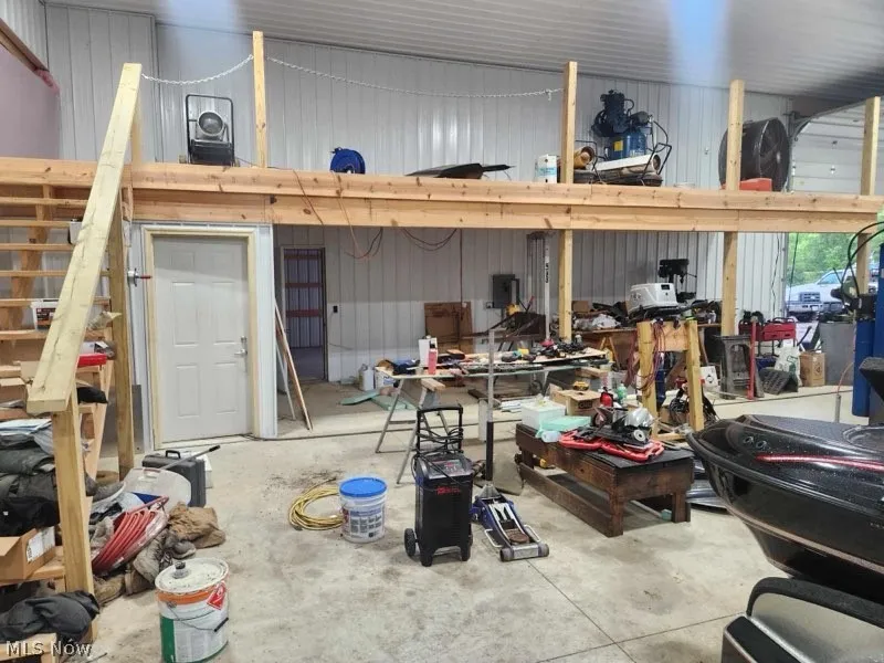 Garage featuring a workshop area