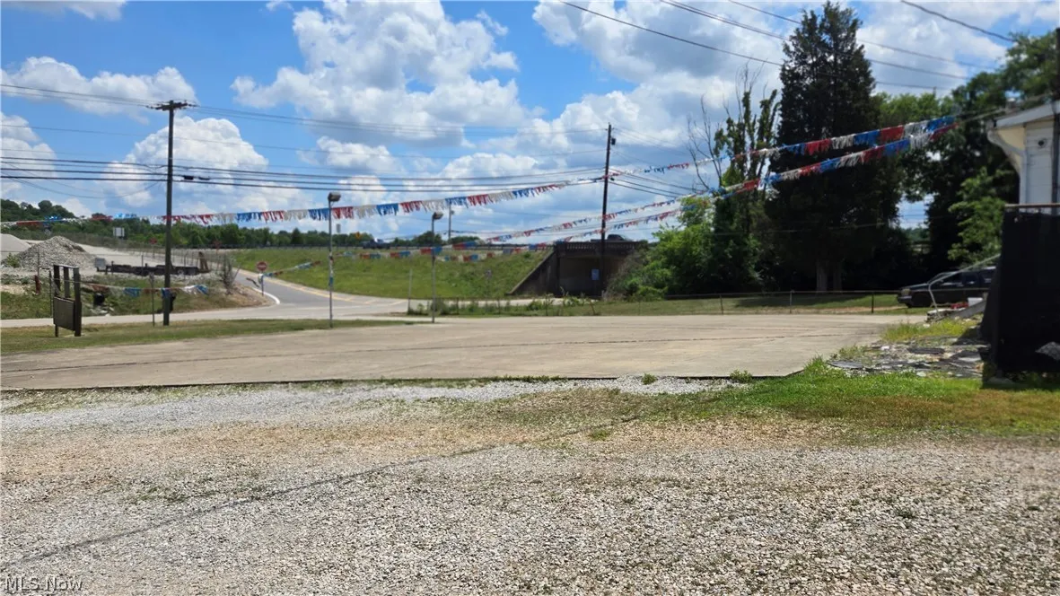 Gravel alley showing the 4000 sq feet of concrete parking