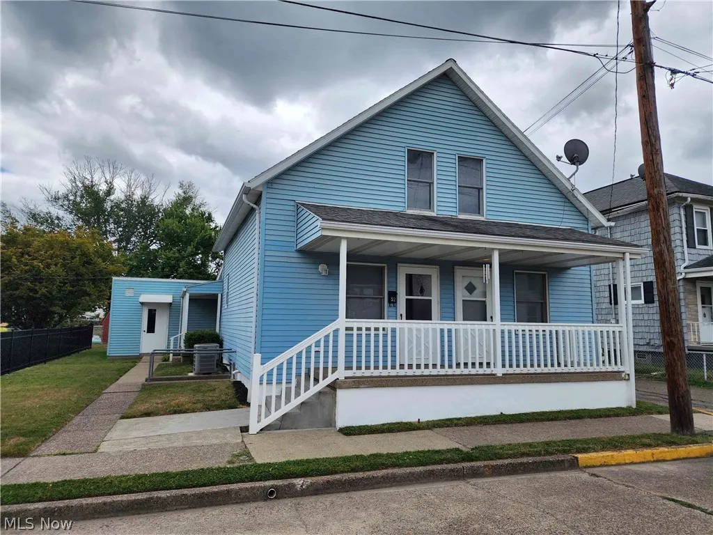 Bungalow-style house featuring a porch