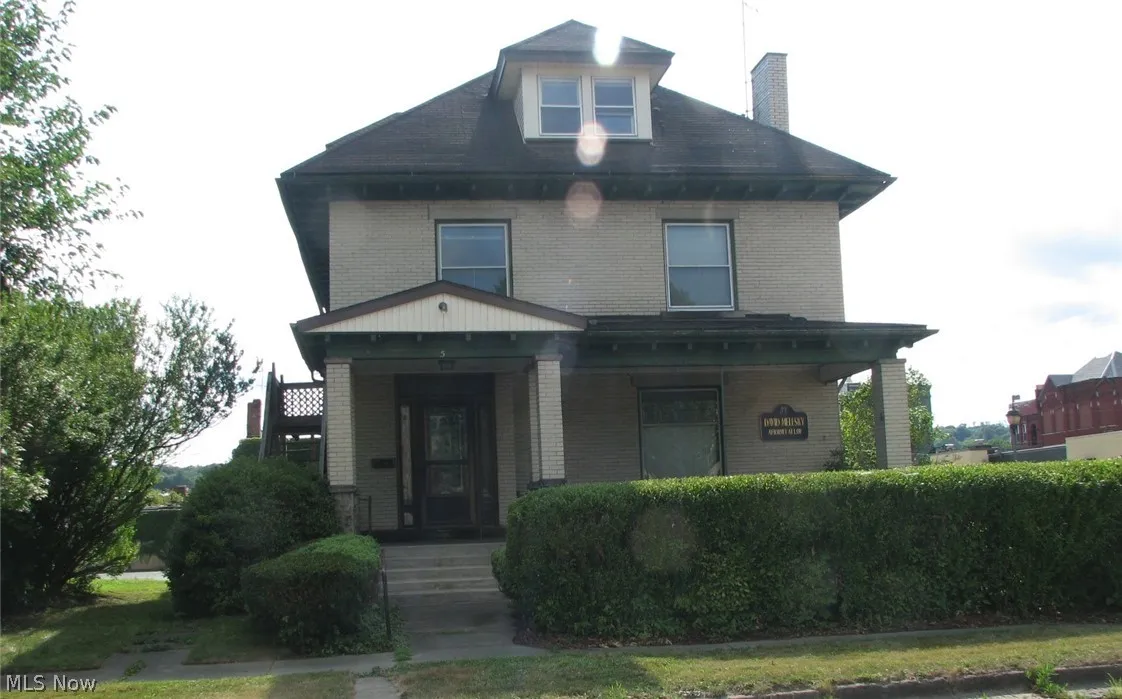 View of front facade featuring covered porch
