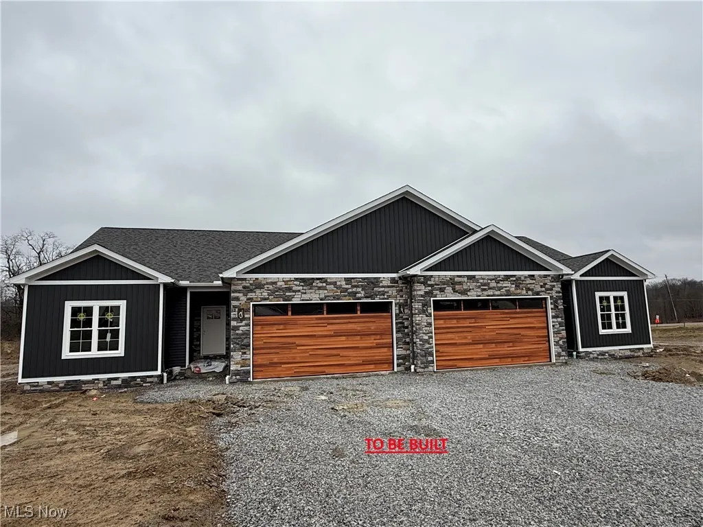View of front of house featuring a garage