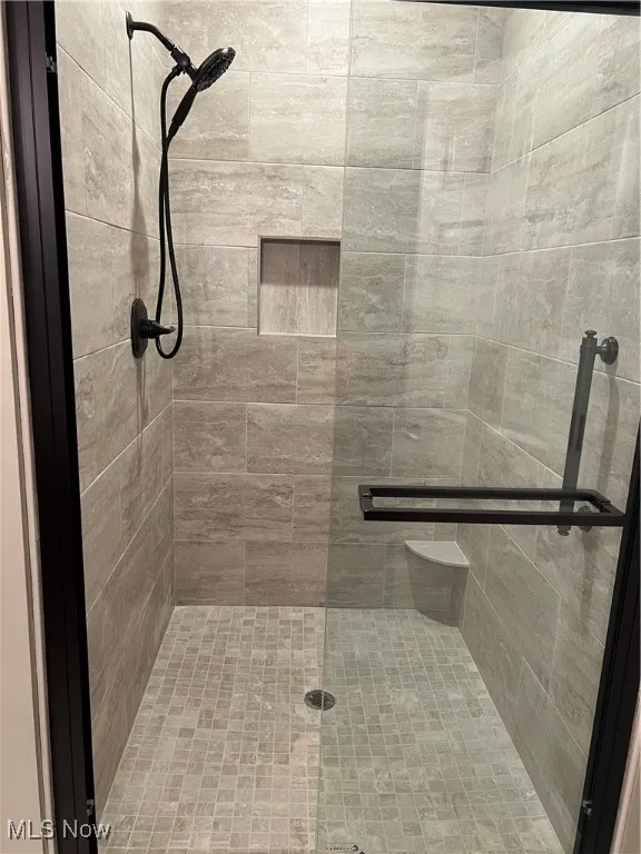 Bathroom with a shower stall