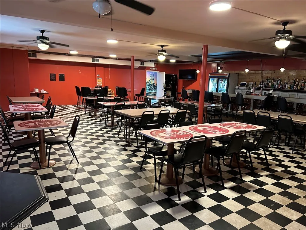 Tiled dining area with ceiling fan