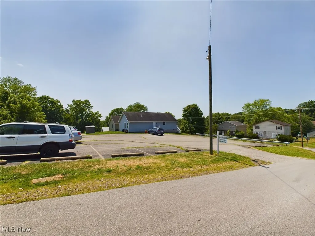 Additional parking lot across street