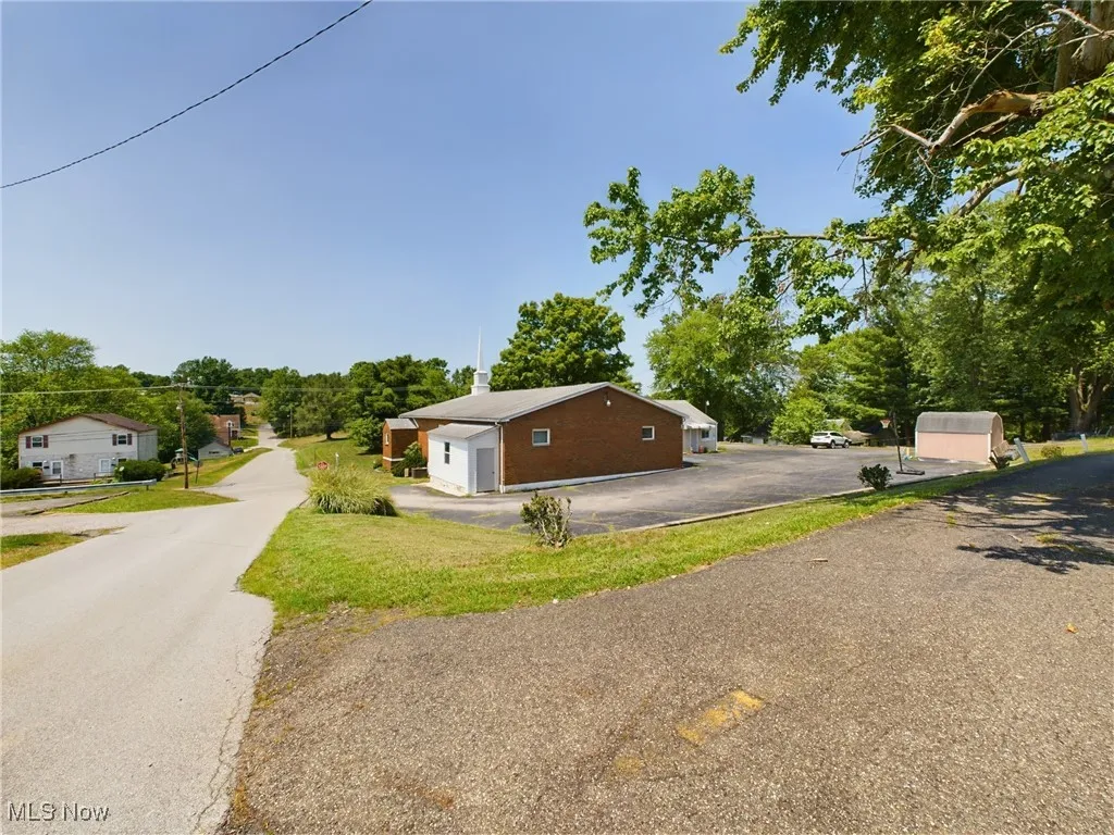 Rear of property with main parking lot and exit from parking