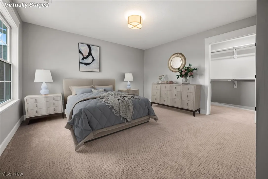Bedroom featuring carpet floors
