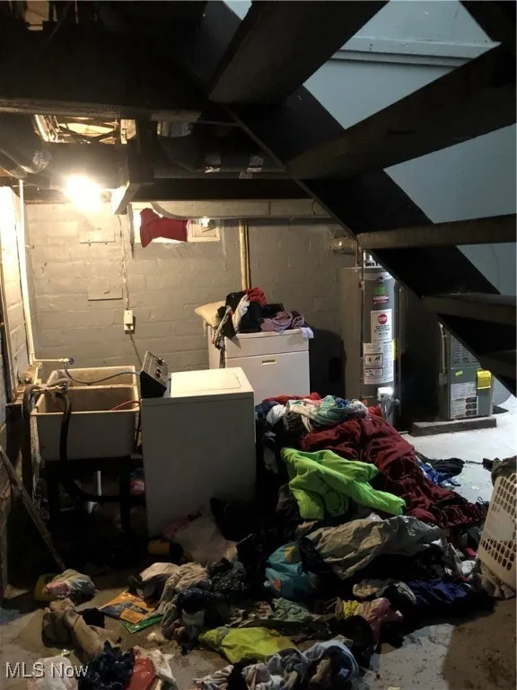 Basement featuring water heater