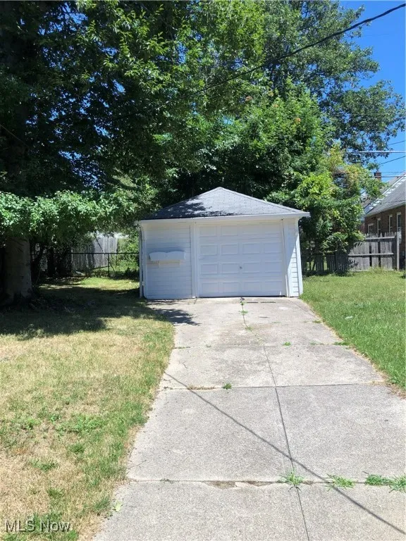 Garage with a lawn