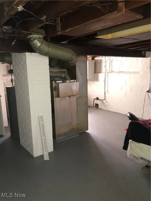 Basement with brick wall