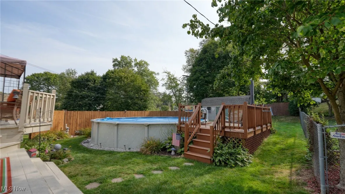 View of yard featuring a pool side deck