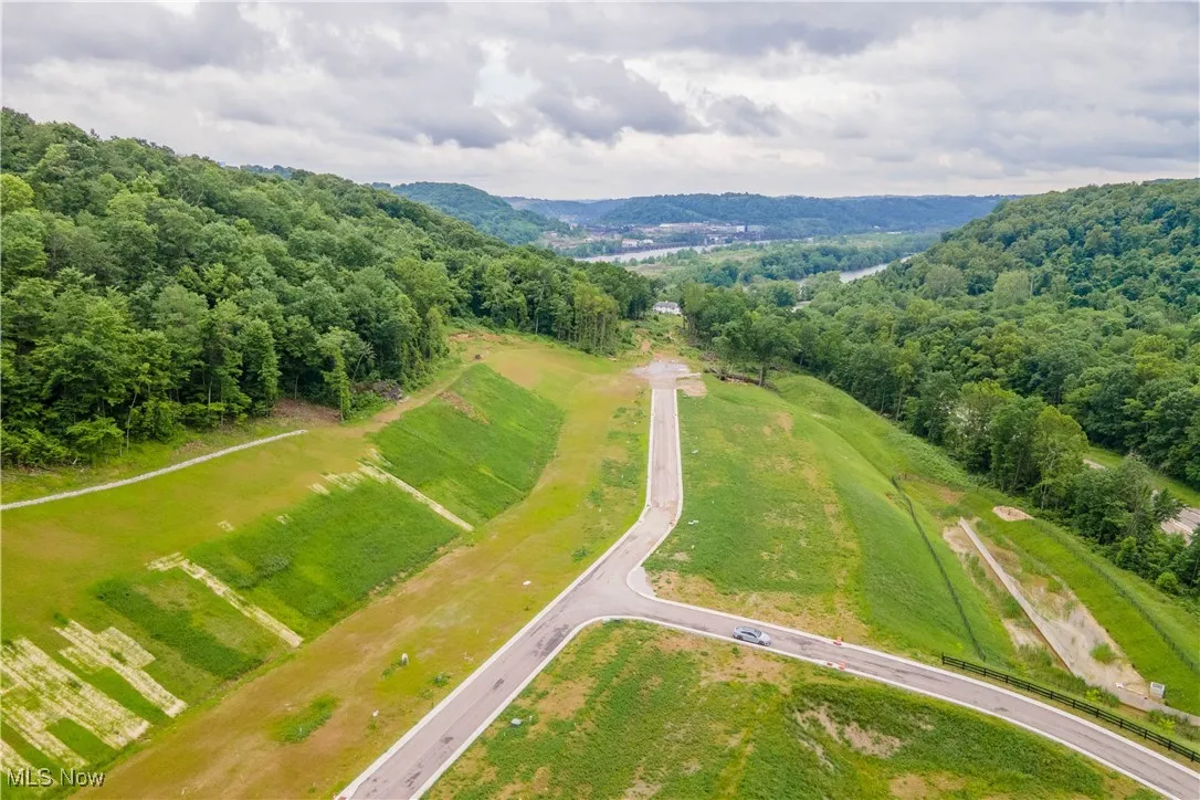 Birds eye view of property featuring a rural view