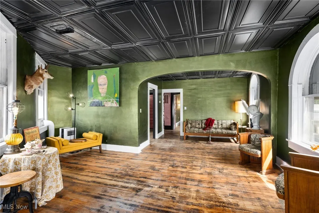 Living area featuring wood-type flooring