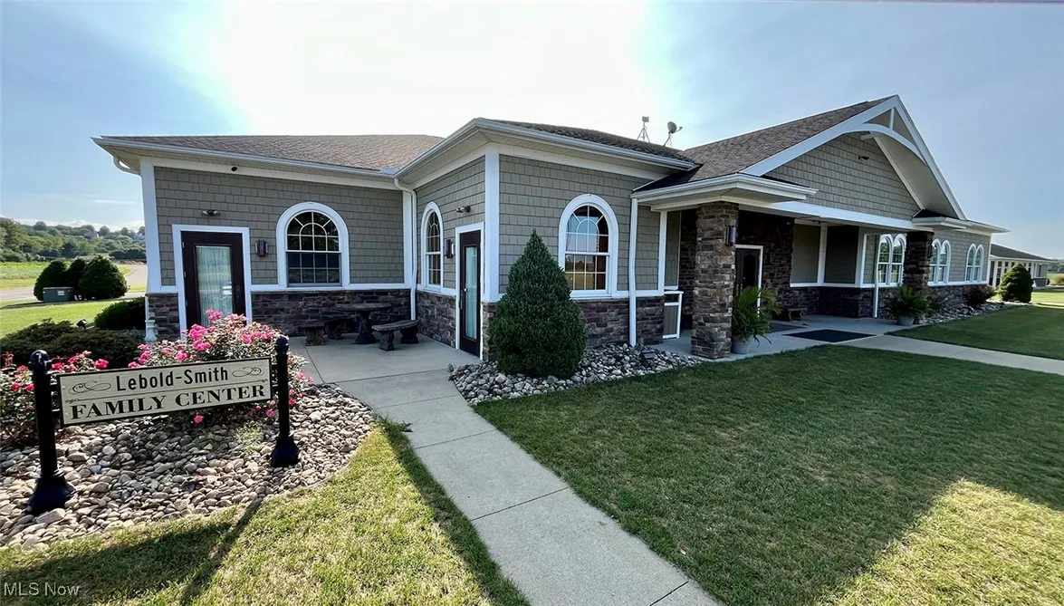 View of front of property with a front yard