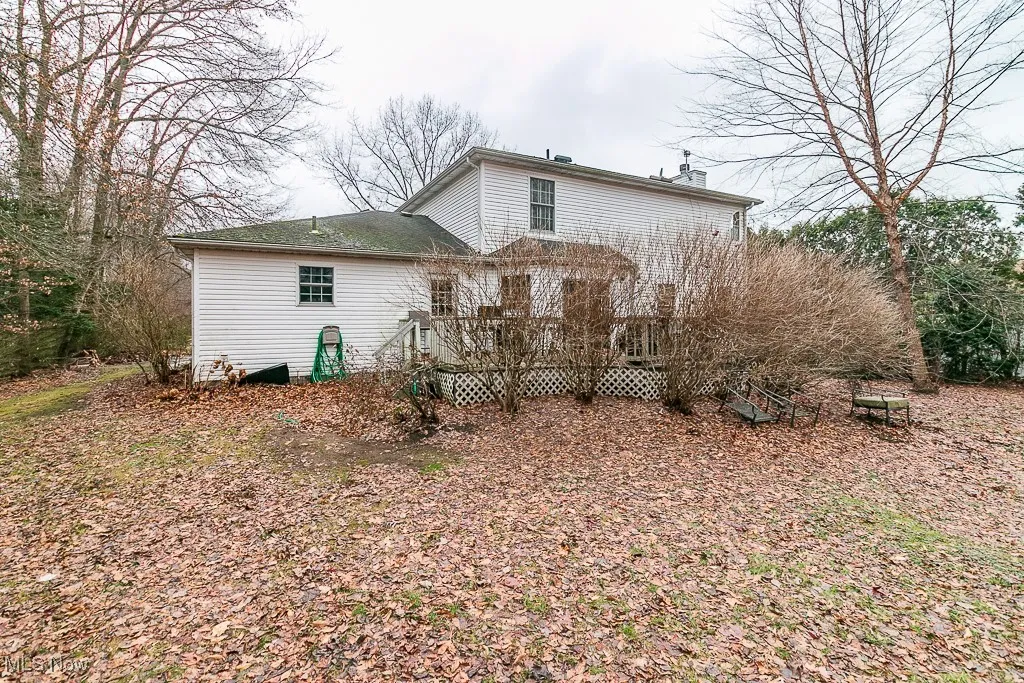 Rear view of property with a deck