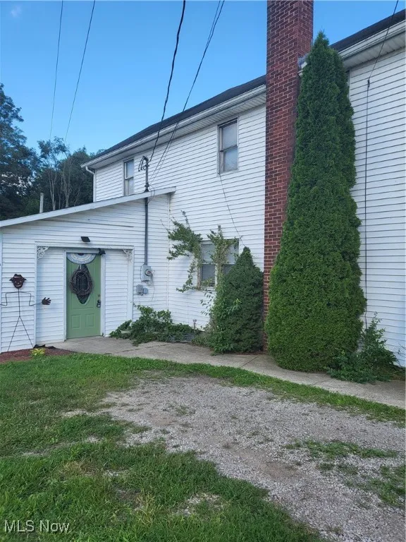 View of home's exterior featuring a garage