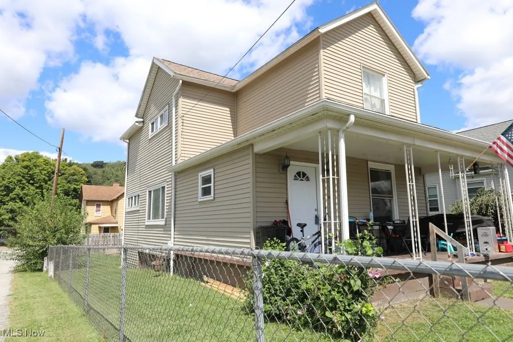 Welcome Home to 1631 Globe Street, East Liverpool.  Fully chain linked fence around entire yard.