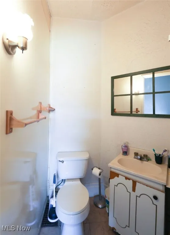 Full Bathroom on the Main Level.  This bathroom is conveniently tucked away in the Office area - just off of the Living Room.  The shower stall is to the right of this picture.