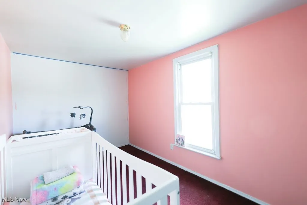 Freshly painted bedroom measures 13 x 11.