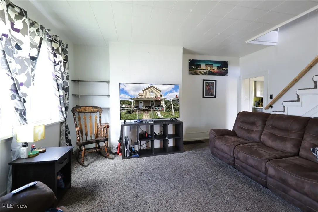 The Carpeted Living Room is 16 x 13.