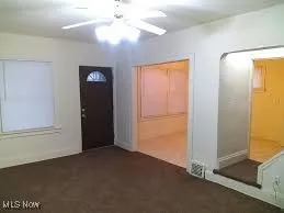 Entryway featuring ceiling fan
