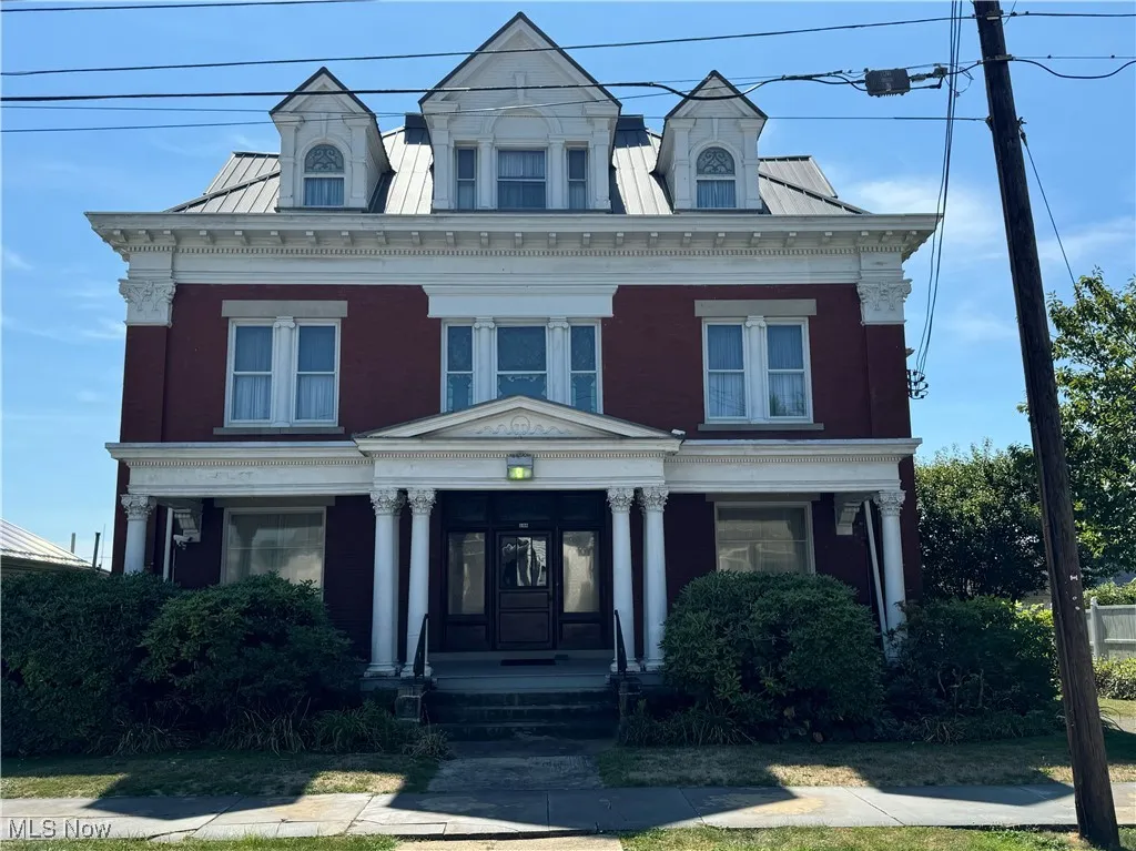 View of front of property featuring a porch