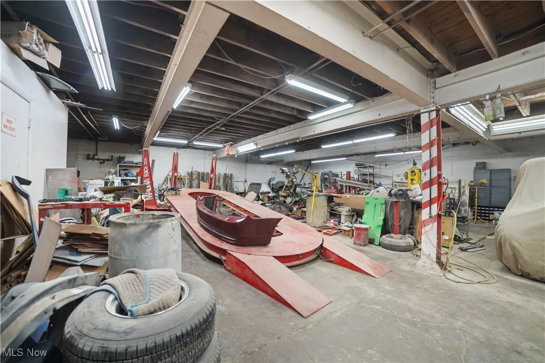 Garage featuring a workshop area