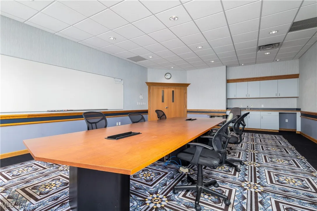 Office space featuring a drop ceiling