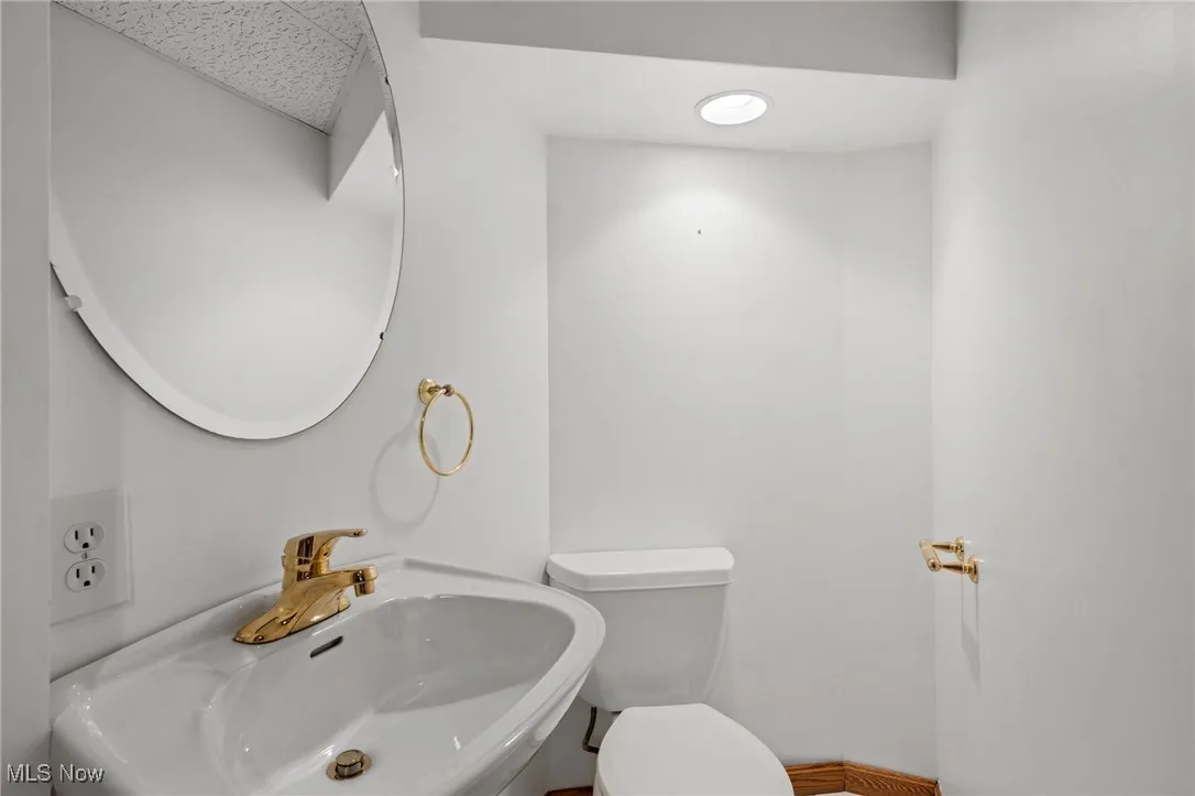 Bathroom with toilet and sink