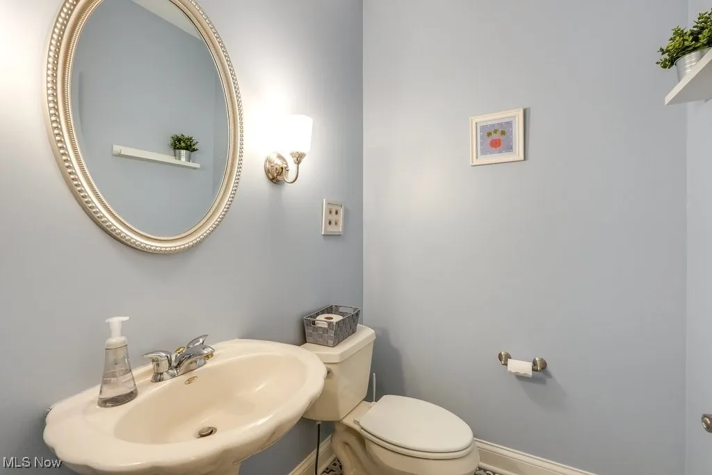 Bathroom with toilet and sink