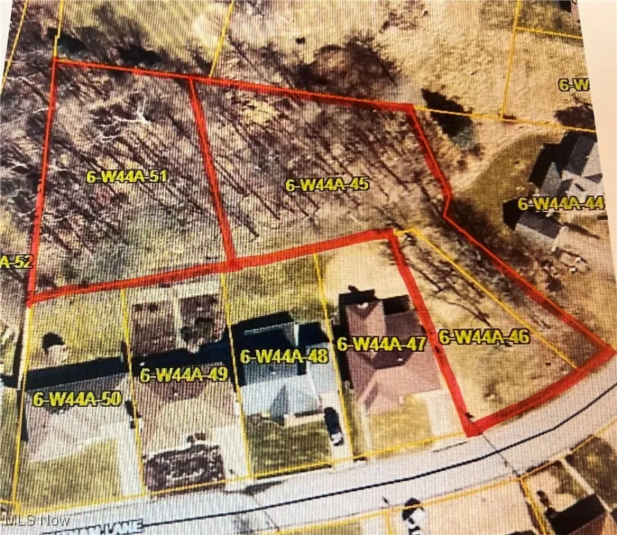 Aerial map of property and surrounding area with property boundaries highlighted