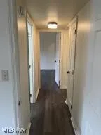 Hall featuring dark hardwood / wood-style floors